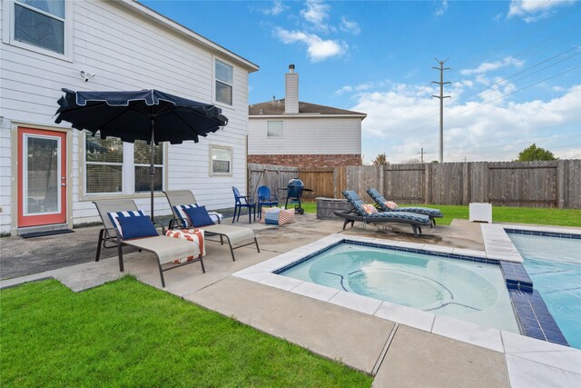 2505 Cypress Springs Ct, Pearland, TX 77584 - view of swimming pool with a patio area and an in-ground hot tub