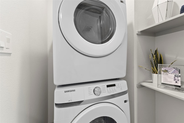 64 Dipping Ln, Houston, TX 77076 - washroom featuring estacked washer and dryer