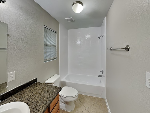 18481 Sunrise Oaks Ct, Montgomery, TX 77316 - bathroom featuring tile patterned flooring, toilet, washtub / shower combination, baseboards, and a textured wall