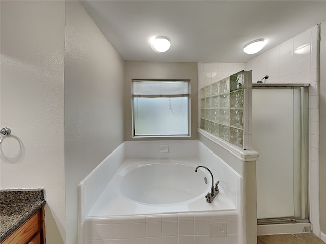 18481 Sunrise Oaks Ct, Montgomery, TX 77316 - bathroom with walk in shower and a bath