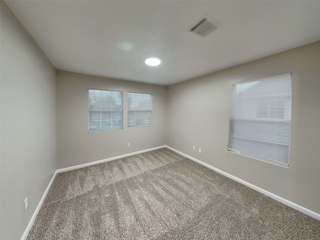 18481 Sunrise Oaks Ct, Montgomery, TX 77316 - spare room featuring baseboards and carpet