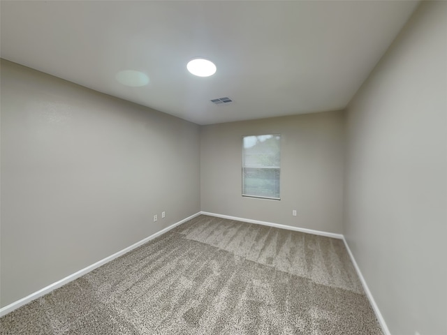 18481 Sunrise Oaks Ct, Montgomery, TX 77316 - spare room with carpet and baseboards