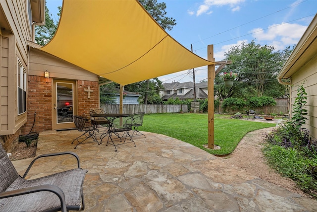 16107 York Minster Dr, Spring, TX 77379 - view of patio featuring a fire pit and outdoor dining space