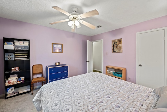 16107 York Minster Dr, Spring, TX 77379 - bedroom with light colored carpet and ceiling fan