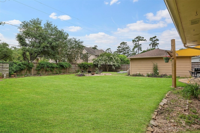 16107 York Minster Dr, Spring, TX 77379 - view of yard featuring a fire pit and a patio area