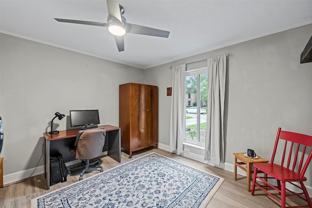 16107 York Minster Dr, Spring, TX 77379 - office area featuring wood finished floors, ceiling fan, ornamental molding, and baseboards