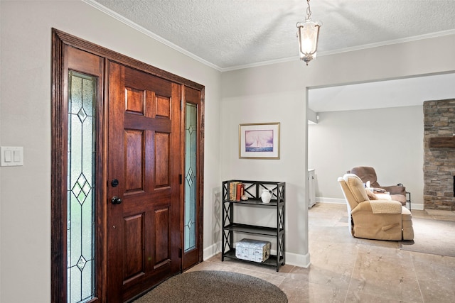 16107 York Minster Dr, Spring, TX 77379 - entryway with a textured ceiling, crown molding, and baseboards