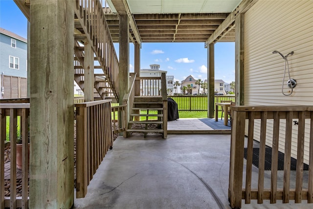 4114 Courageous Ln, Galveston, TX 77554 - view of patio featuring stairway and a residential view