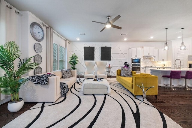 4008 Centre Glen Dr, Houston, TX 77043 - living room featuring ceiling fan, wood finished floors, and recessed lighting