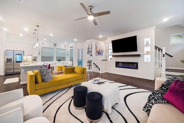 4008 Centre Glen Dr, Houston, TX 77043 - living area featuring baseboards, a ceiling fan, recessed lighting, stairway, and a glass covered fireplace