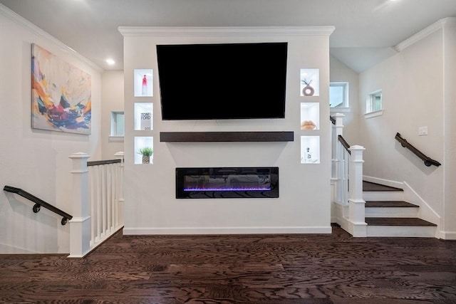 4008 Centre Glen Dr, Houston, TX 77043 - unfurnished living room featuring a glass covered fireplace, baseboards, crown molding, wood finished floors, and lofted ceiling