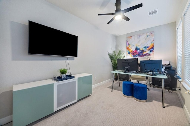 4008 Centre Glen Dr, Houston, TX 77043 - home office featuring light colored carpet, baseboards, and a ceiling fan