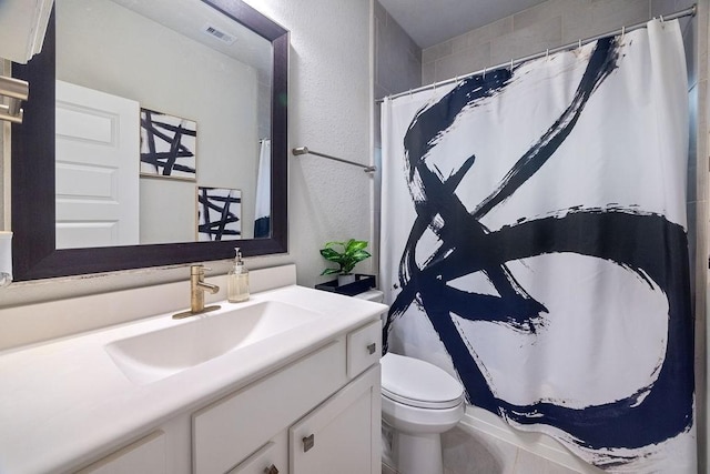 4008 Centre Glen Dr, Houston, TX 77043 - full bathroom featuring vanity, toilet, a textured wall, and a shower with shower curtain