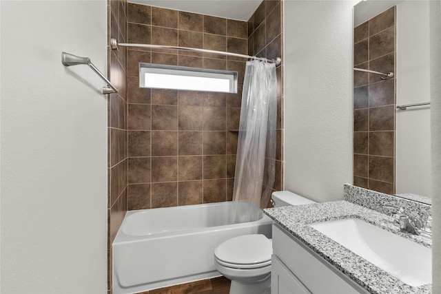 5166 Echo Falls Dr, Alvin, TX 77511 - bathroom with toilet, shower / bath combination with curtain, vanity, and a textured wall