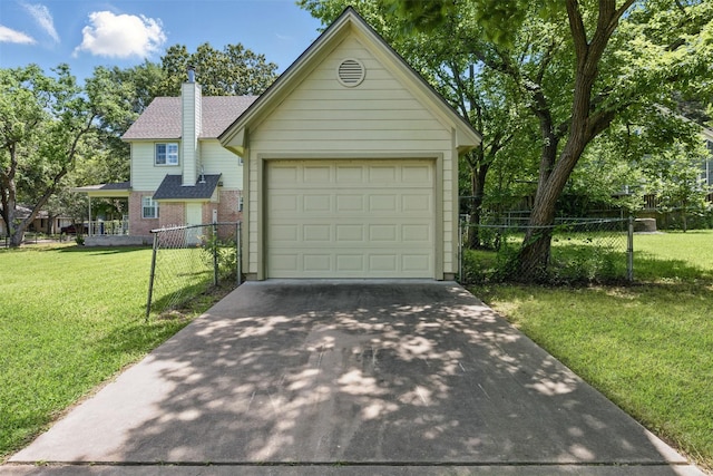 407 W Main St, Brenham, TX 77833 - view of front of home featuring driveway, a chimney, a garage, and brick siding
