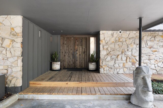 827 Magnolia St, Livingston, TX 77351 - view of exterior entry with stone siding