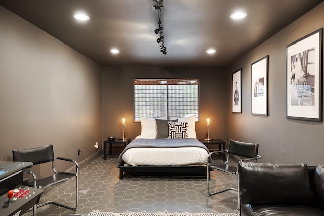 827 Magnolia St, Livingston, TX 77351 - bedroom with recessed lighting, rail lighting, and baseboards