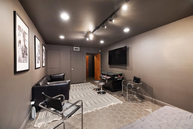 827 Magnolia St, Livingston, TX 77351 - cinema room with baseboards and recessed lighting