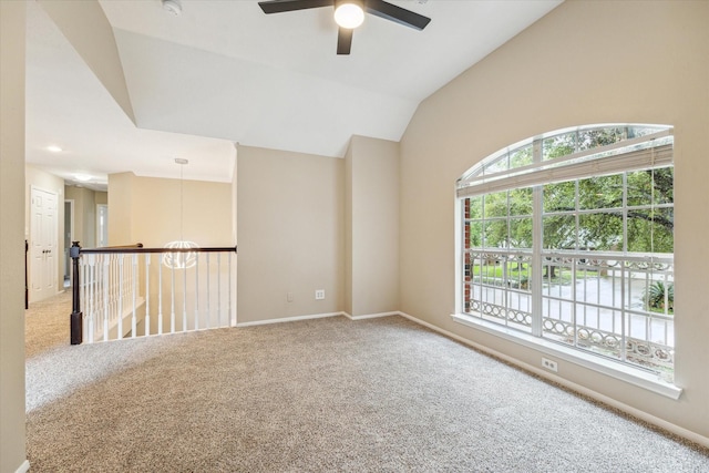 17426 Little Riata Dr, Houston, TX 77095 - unfurnished room featuring carpet flooring, ceiling fan, a chandelier, baseboards, and lofted ceiling