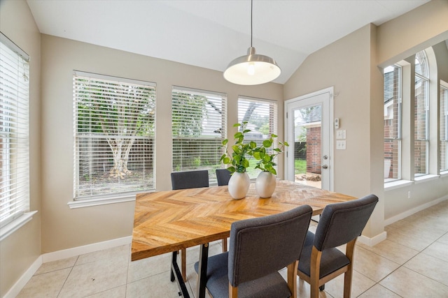 17426 Little Riata Dr, Houston, TX 77095 - dining room featuring light tile patterned floors, baseboards, and lofted ceiling