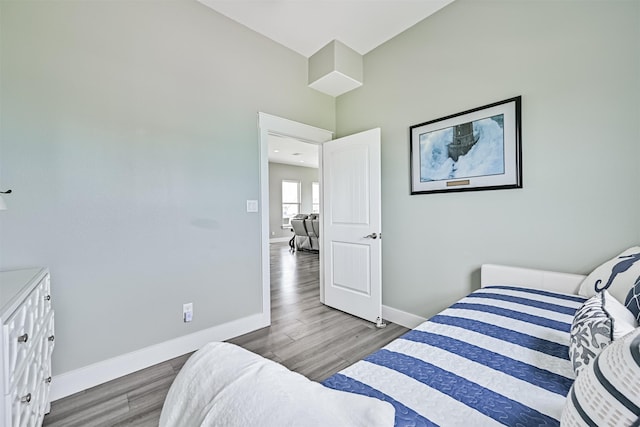 16631 Jean Lafitte Rd, Galveston, TX 77554 - bedroom with baseboards and wood finished floors