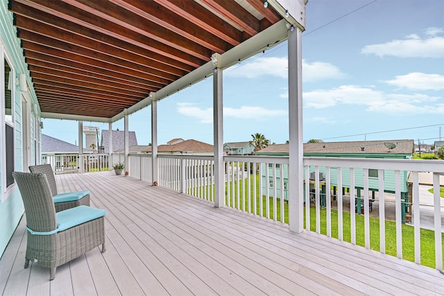 16631 Jean Lafitte Rd, Galveston, TX 77554 - wooden deck with a yard and a residential view