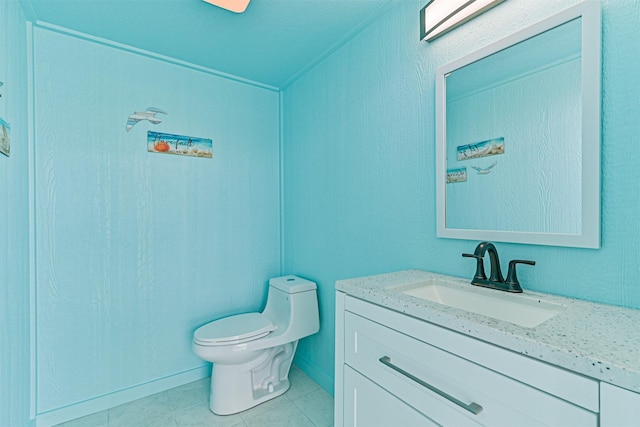 16631 Jean Lafitte Rd, Galveston, TX 77554 - bathroom featuring toilet, vanity, and tile patterned flooring
