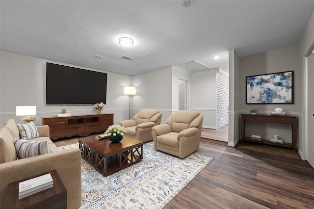 6211 Sjolander Rd, Baytown, TX 77521 - living room featuring wood finished floors, baseboards, and recessed lighting