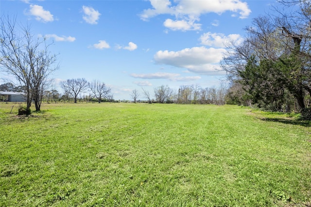 6211 Sjolander Rd, Baytown, TX 77521 - view of grassy yard featuring a rural view