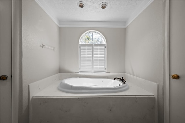 6211 Sjolander Rd, Baytown, TX 77521 - bathroom with a textured ceiling, crown molding, and a garden tub