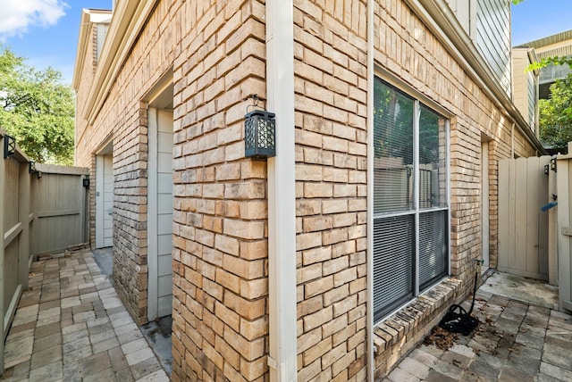 1829 Augusta Dr Unit 33, Houston, TX 77057 - view of home's exterior featuring brick siding