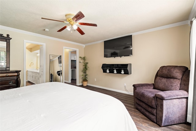 bedroom featuring dark wood-style flooring, ornamental molding, baseboards, a ceiling fan, and ensuite bath