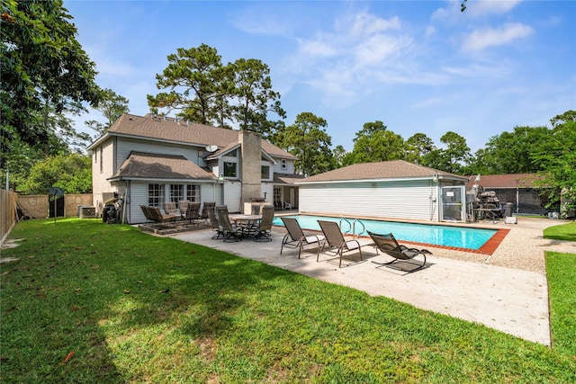 rear view of property with a patio