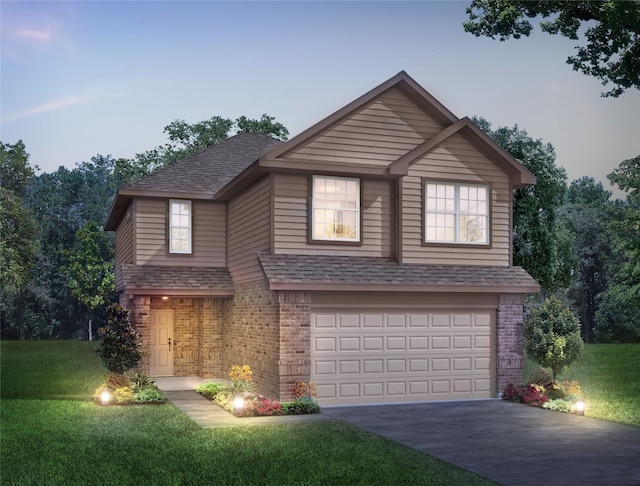 2339 E Chunk Dr, Conroe, TX 77301 - view of front facade with brick siding, a garage, a front yard, and driveway