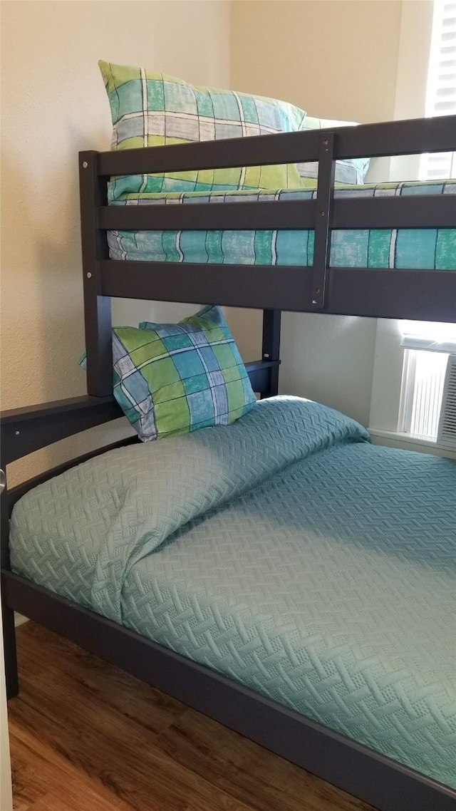 1207 29th St, Galveston, TX 77550 - bedroom featuring wood finished floors