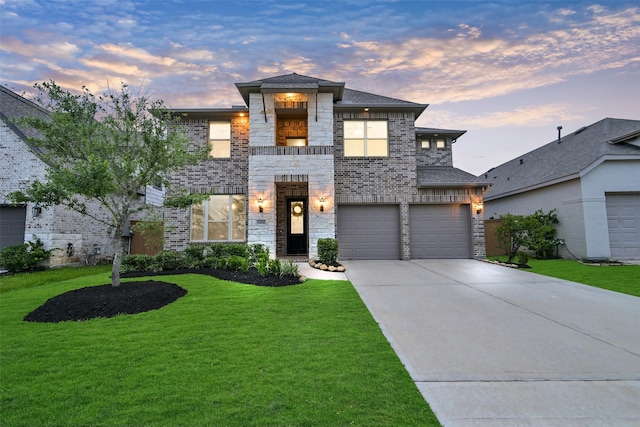 15606 Upper Lochton Dr, Humble, TX 77346 - contemporary home featuring a front yard, stone siding, driveway, and an attached garage