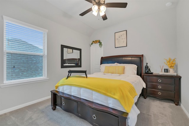 15606 Upper Lochton Dr, Humble, TX 77346 - carpeted bedroom featuring baseboards, vaulted ceiling, and a ceiling fan