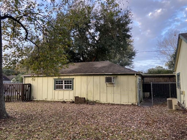 3755 Long Ave, Beaumont, TX 77706 - view of outbuilding featuring fence, a wall mounted air conditioner, and central air condition unit