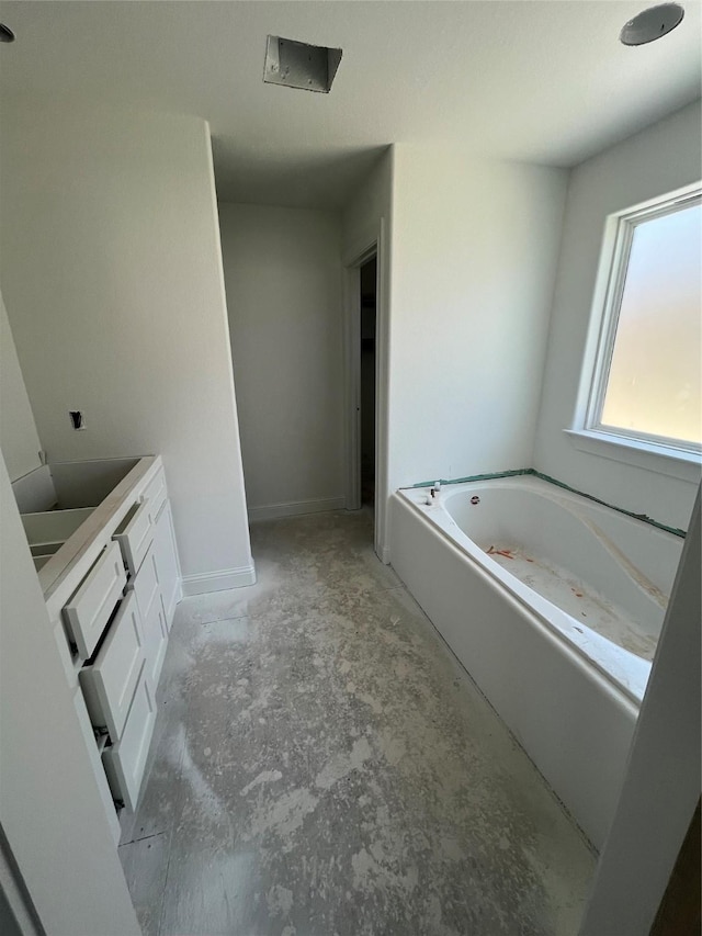 118 Capetown, Conroe, TX 77356 - full bath with a garden tub, baseboards, and vanity