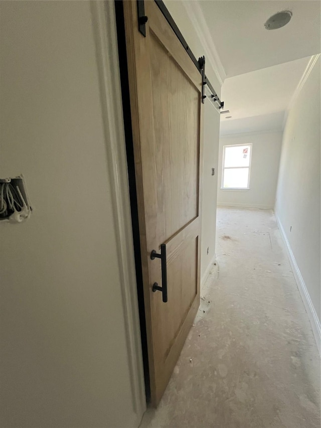 118 Capetown, Conroe, TX 77356 - hallway with a barn door and baseboards
