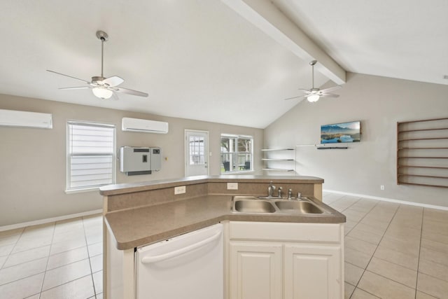 kitchen featuring dishwasher, a ceiling fan, a sink, a wall unit AC, and light tile patterned floors