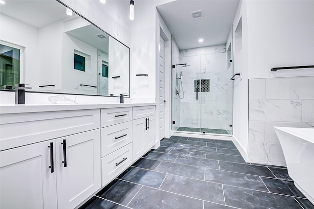 1913 Hoskins Dr Unit D, Houston, TX 77080 - bathroom with a shower stall, double vanity, a freestanding tub, and tile patterned flooring