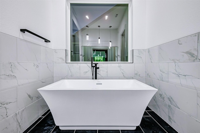 1913 Hoskins Dr Unit D, Houston, TX 77080 - bathroom featuring tile walls and a freestanding bath