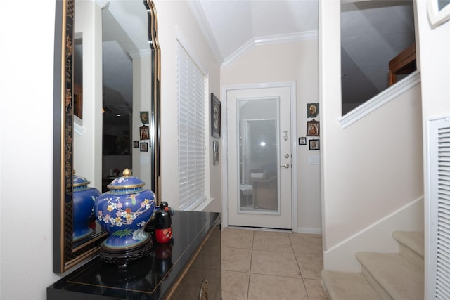 25230 Aspenlodge Ln, Katy, TX 77494 - entryway featuring light tile patterned floors, stairway, and ornamental molding