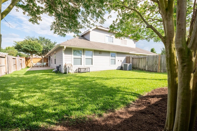25230 Aspenlodge Ln, Katy, TX 77494 - back of house featuring central air condition unit, a patio area, and a shingled roof