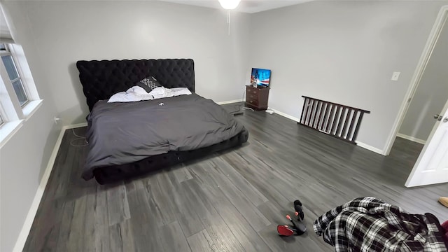2263 Triway Ln, Houston, TX 77043 - bedroom with wood finished floors and baseboards