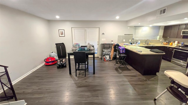 2263 Triway Ln, Houston, TX 77043 - office with dark wood finished floors, recessed lighting, a sink, and baseboards