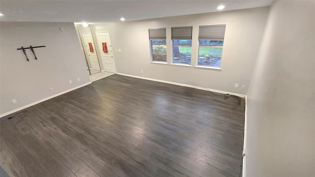 2263 Triway Ln, Houston, TX 77043 - empty room with recessed lighting, baseboards, and dark wood-style flooring