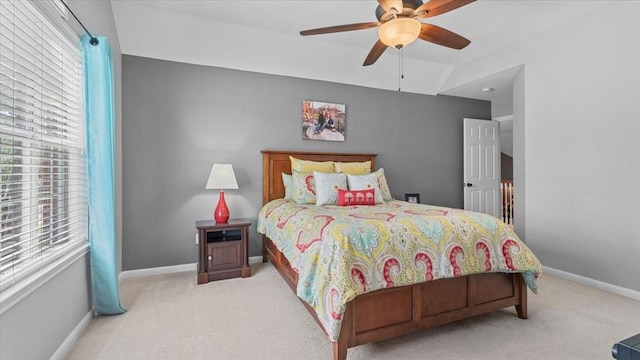 13402 Layton Castle Ln, Cypress, TX 77429 - carpeted bedroom with baseboards and ceiling fan