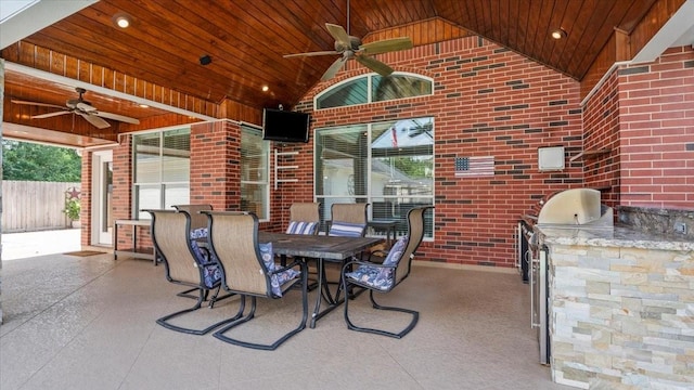 13402 Layton Castle Ln, Cypress, TX 77429 - view of patio featuring a ceiling fan, an outdoor kitchen, fence, and outdoor dining area